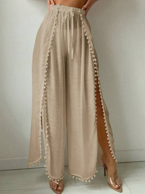 Saída De Praia Calça Fluida Com Fendas E Detalhe Pompons