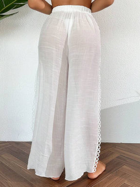 Saída De Praia Calça Fluida Com Fenda Bordada